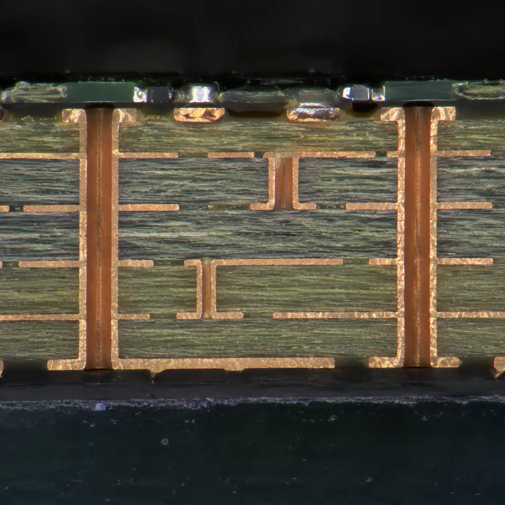 Photorealistic cross-section micrograph of a multilayer PCB showing copper traces, plated through-holes and laminate layers